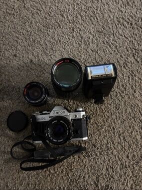 Canon AE-1 Silver & Black Film Camera Kit with Flash and Lenses